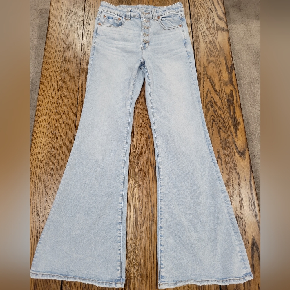 American Eagle High Rise Distressed Stretch Flare Light Wash Jeans